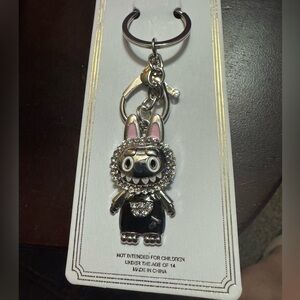 Pop Mart Monsters by Labubu 10th Anniversary acrylic shaker keychain.